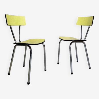 Pair of yellow formica chairs.