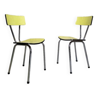 Paire de chaises en formica jaune.