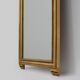 Miroir de style Empire en bois doré du XXe siècle