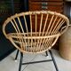 Old vintage metal foot rattan chair