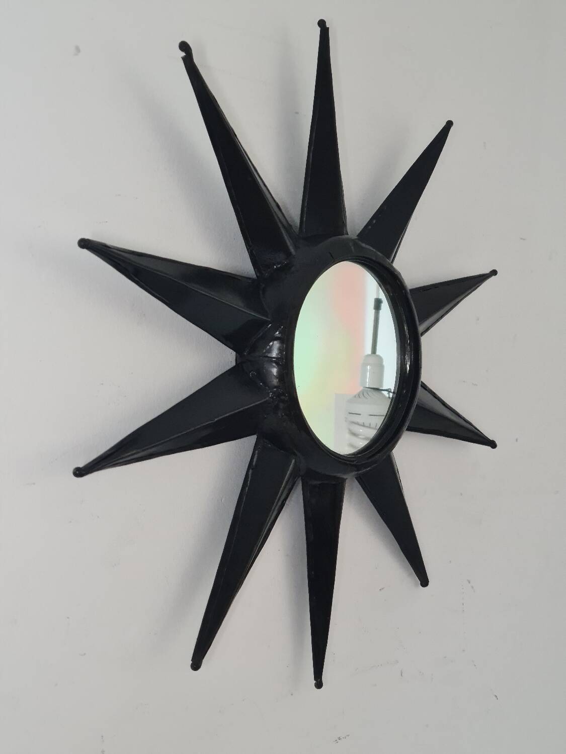 Antique metal star wall mirror black