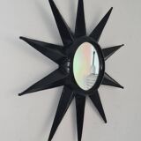 Antique metal star wall mirror black