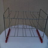 Former metal shopping cart shelf