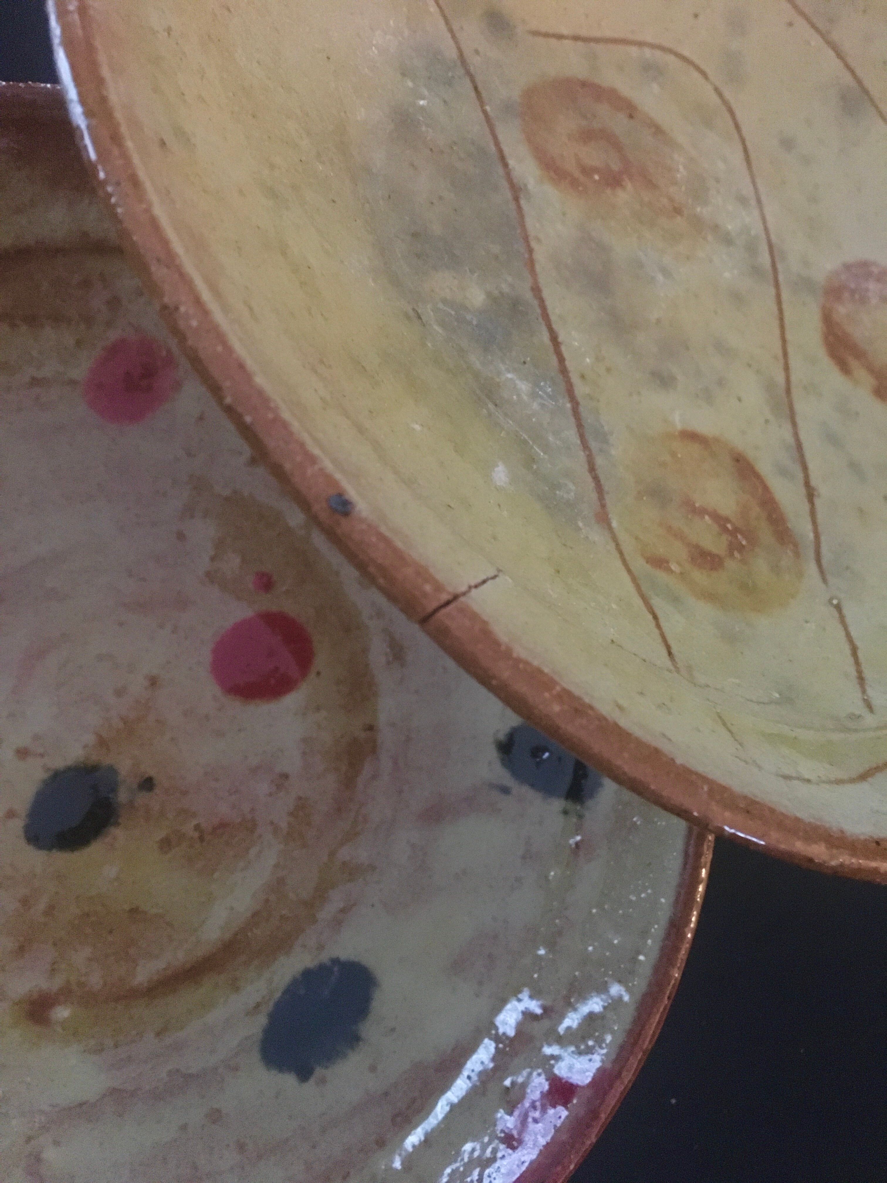 Decorated terracotta duo of dishes