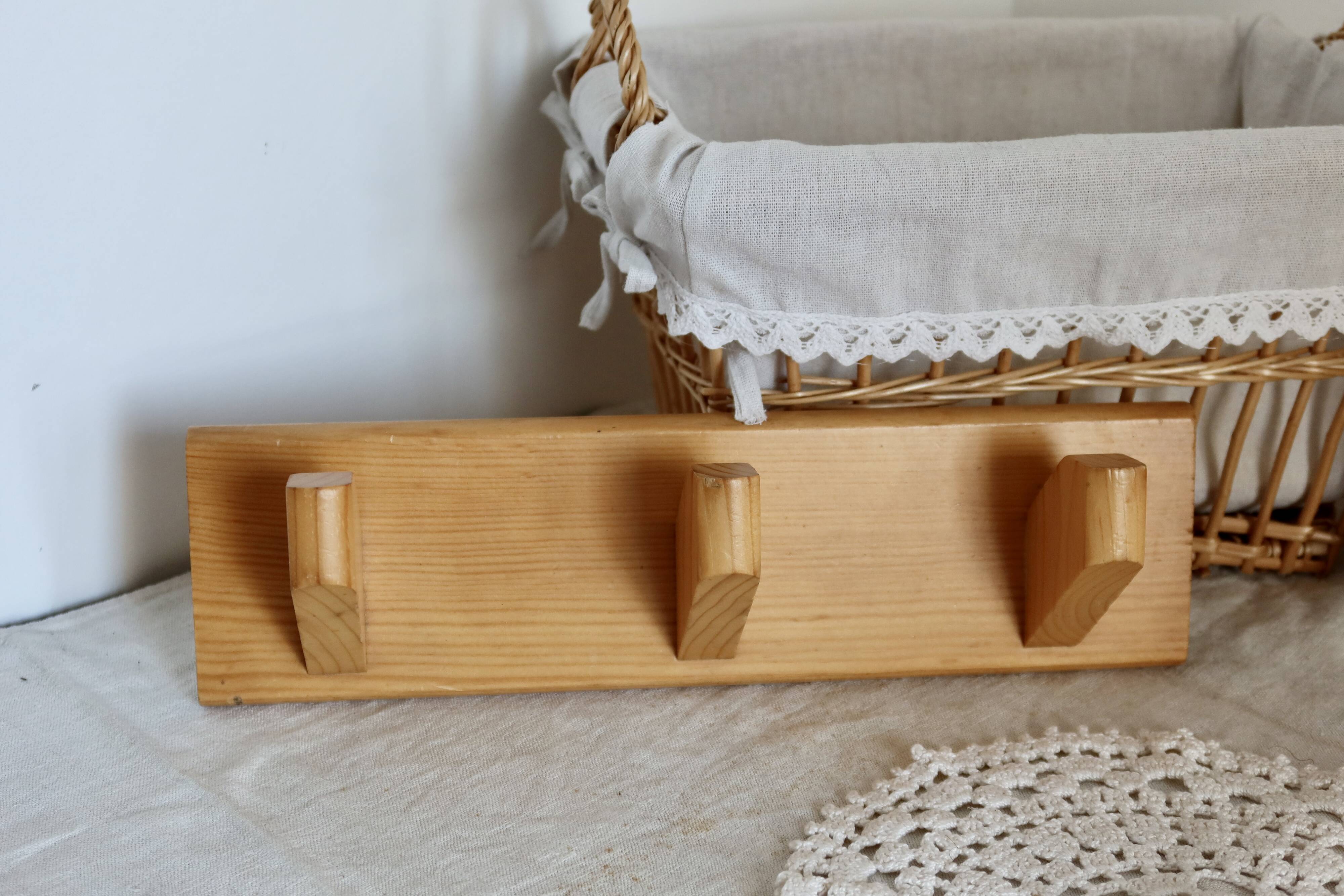 Vintage wall coat rack in pine with 3 hooks.