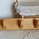 Vintage wall coat rack in pine with 3 hooks.