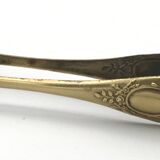 Sugar or ice cube tongs, gold star stamp with lion paw finish