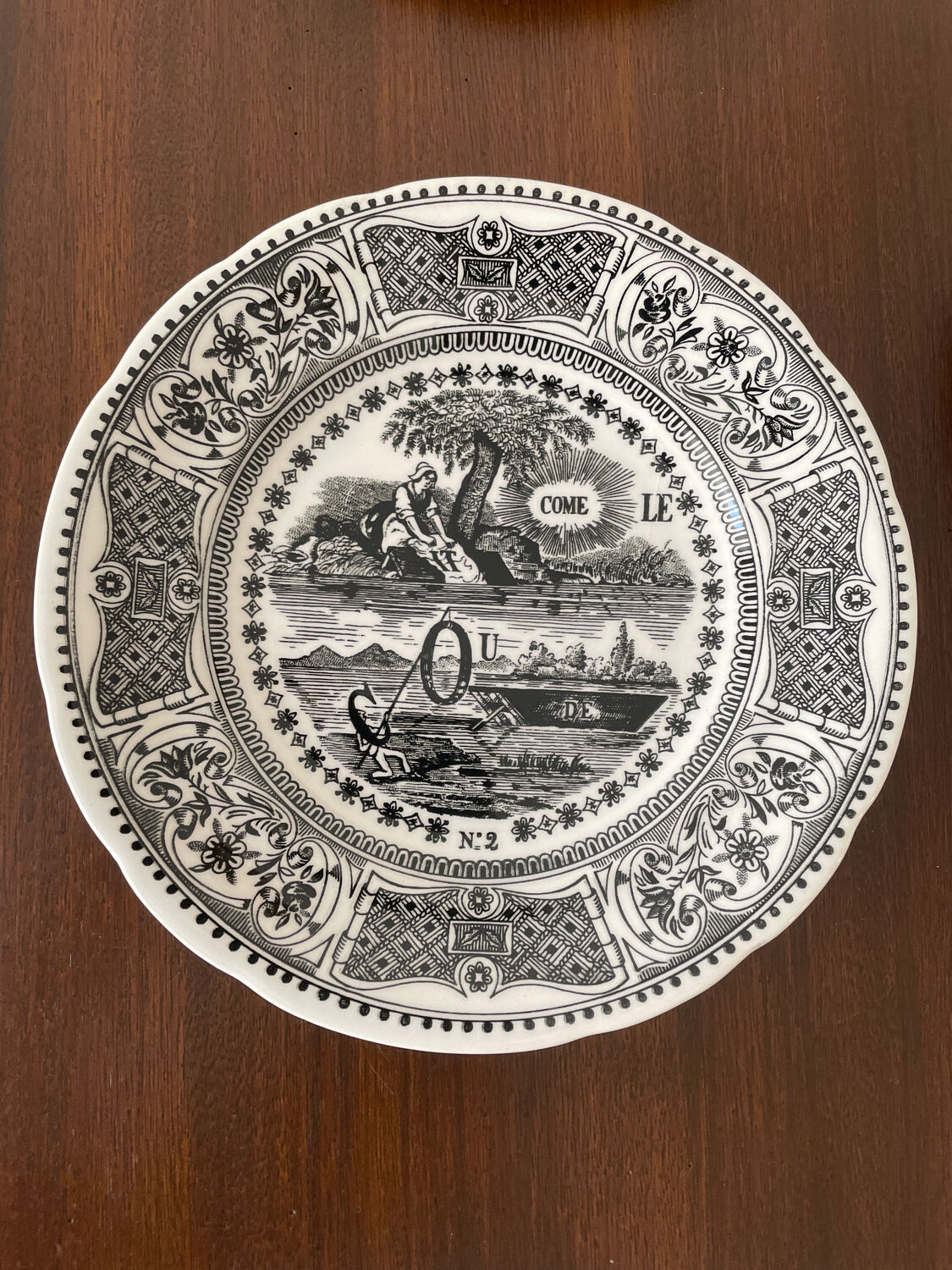 Set of 9 plates Gien "rebus".