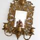 Bevelled mirror wall sconce in gilded bronze with 3 candle holders.