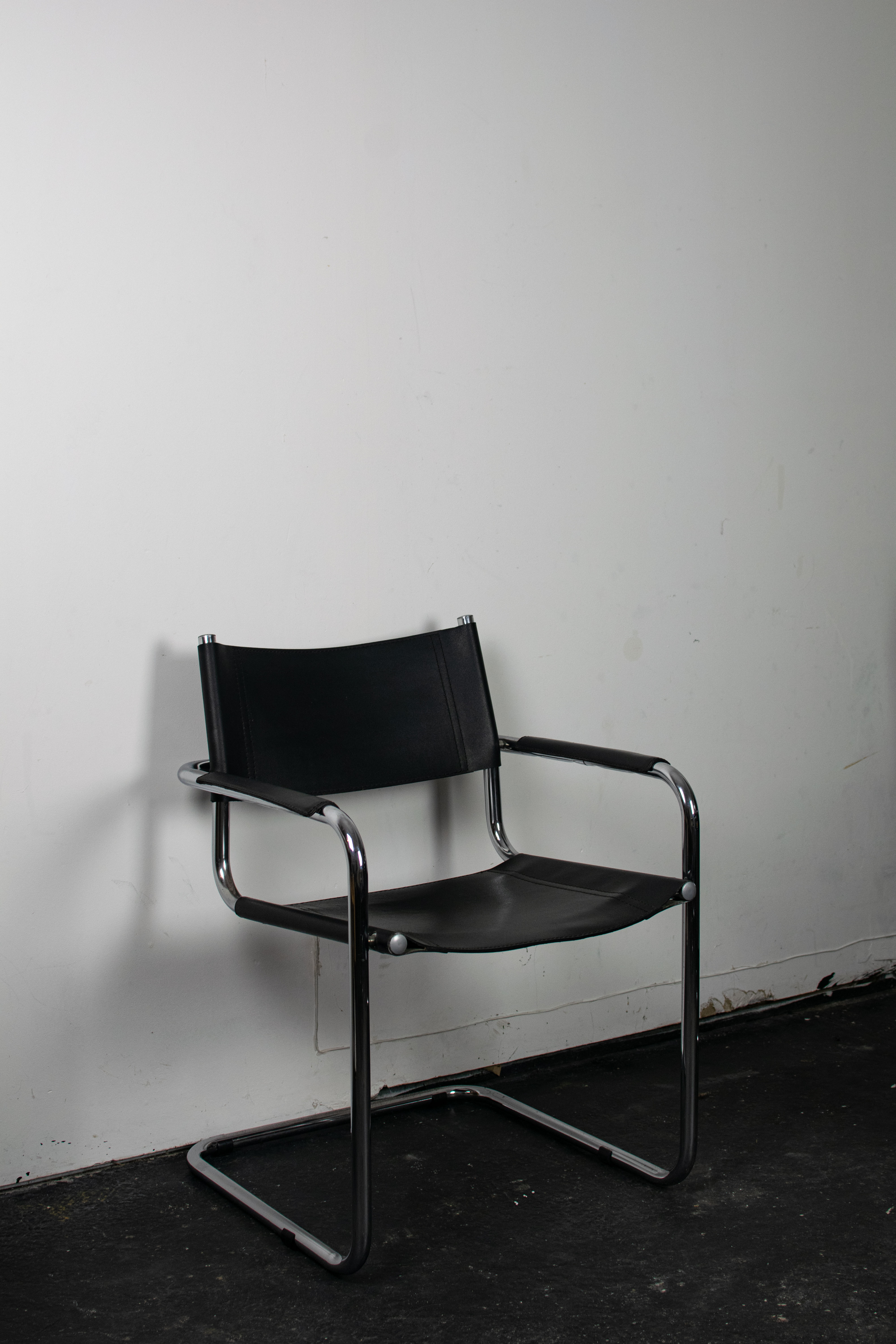 Black leather cantilever armchair 70s-80s