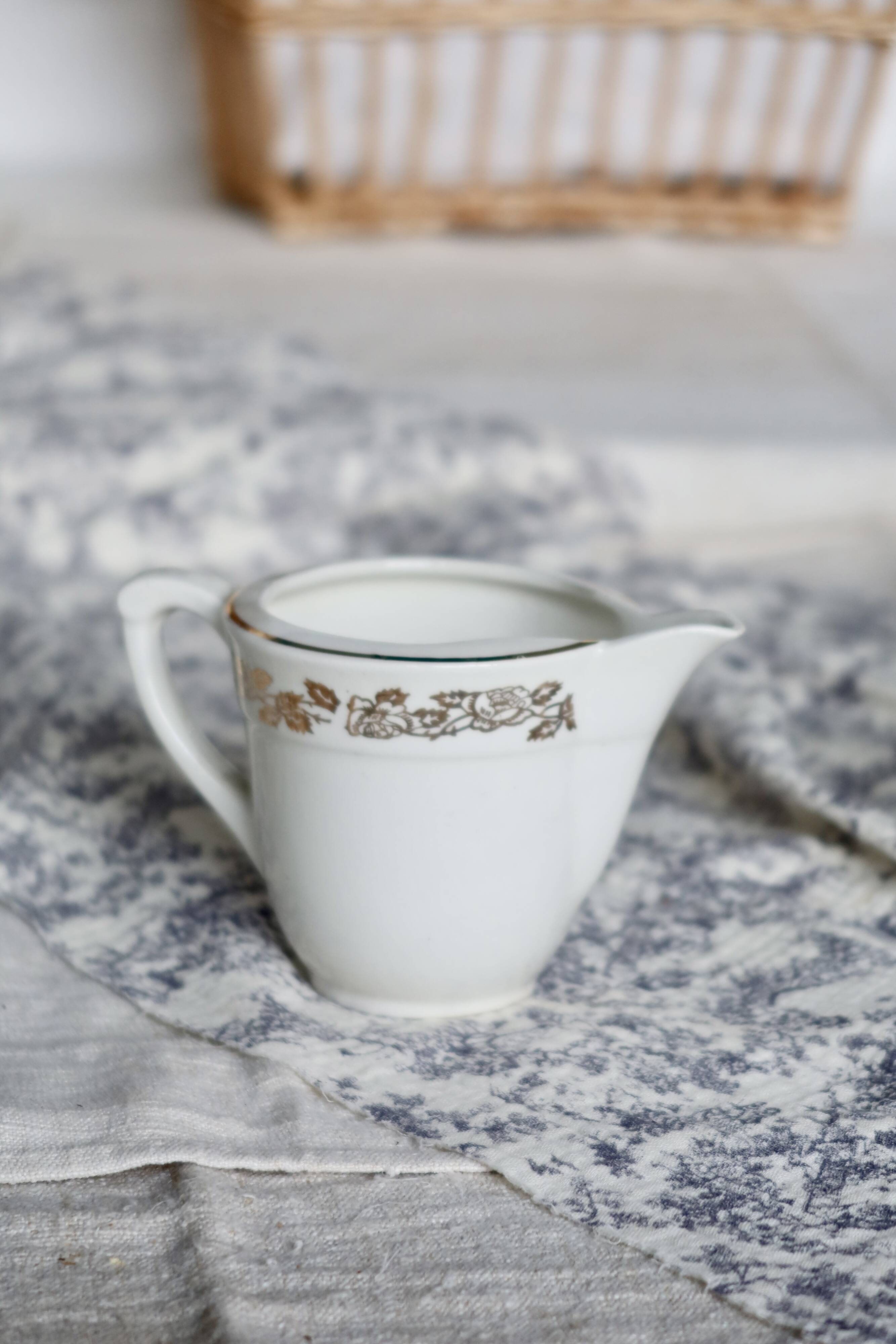 Vintage earthenware milk jug from Moulin des Loups – Gold floral motif