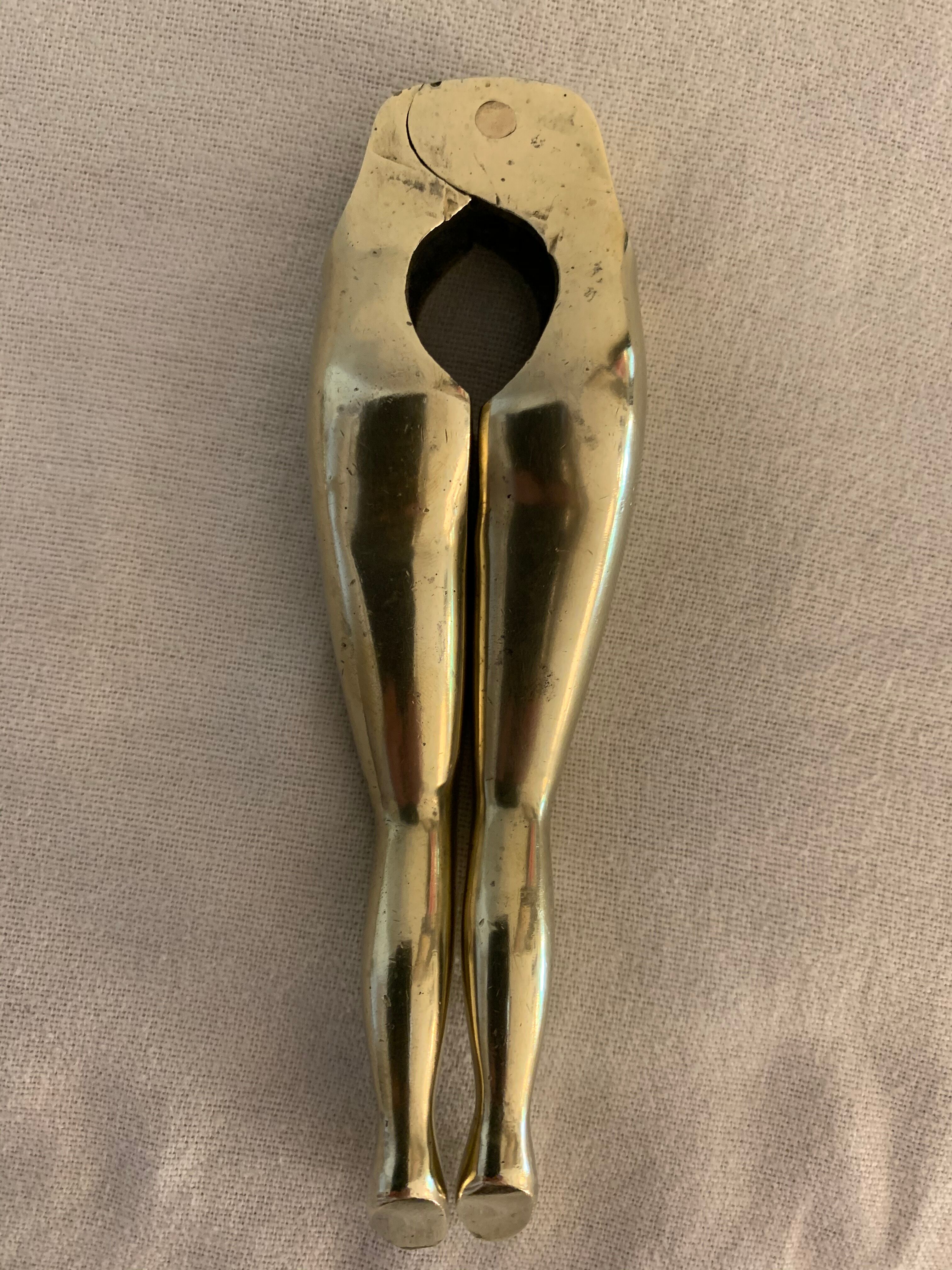 Pair of nutcrackers or anthropomorphic hazelnuts in bronze