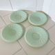 Set of 4 mint green opaline saucers with a swirl pattern, made in France.