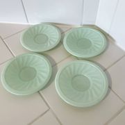 Set of 4 mint green opaline saucers with a swirl pattern, made in France.