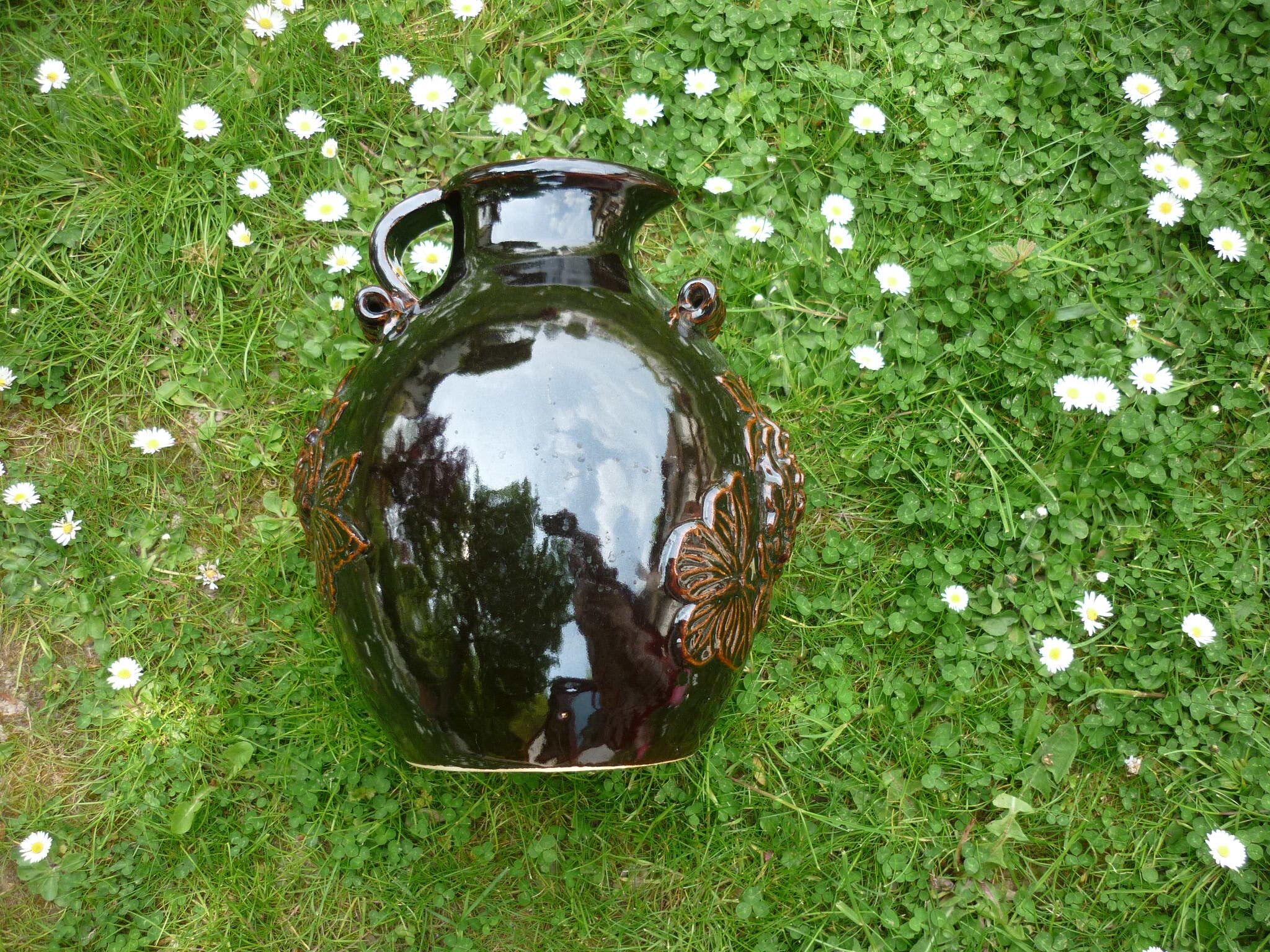 Dark brown ceramic potiche