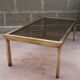 Brass coffee table and 1970 smoked glass