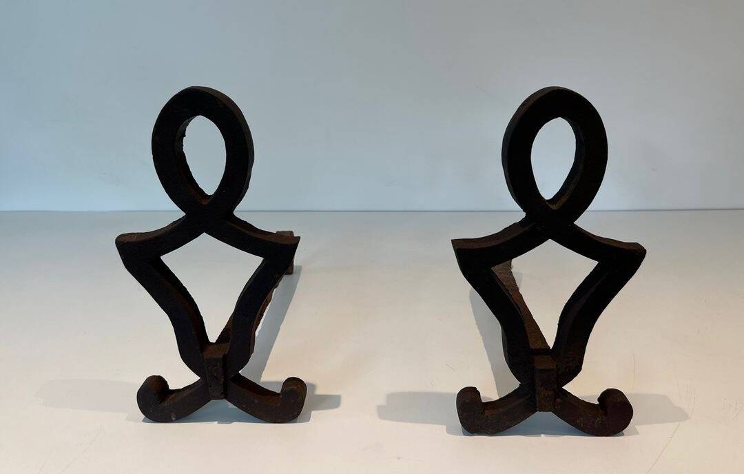 Pair of Modernist Andirons in Cast Iron with Stylised Figure Supports, by Ray