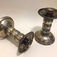 Pair of silver metal candle holders