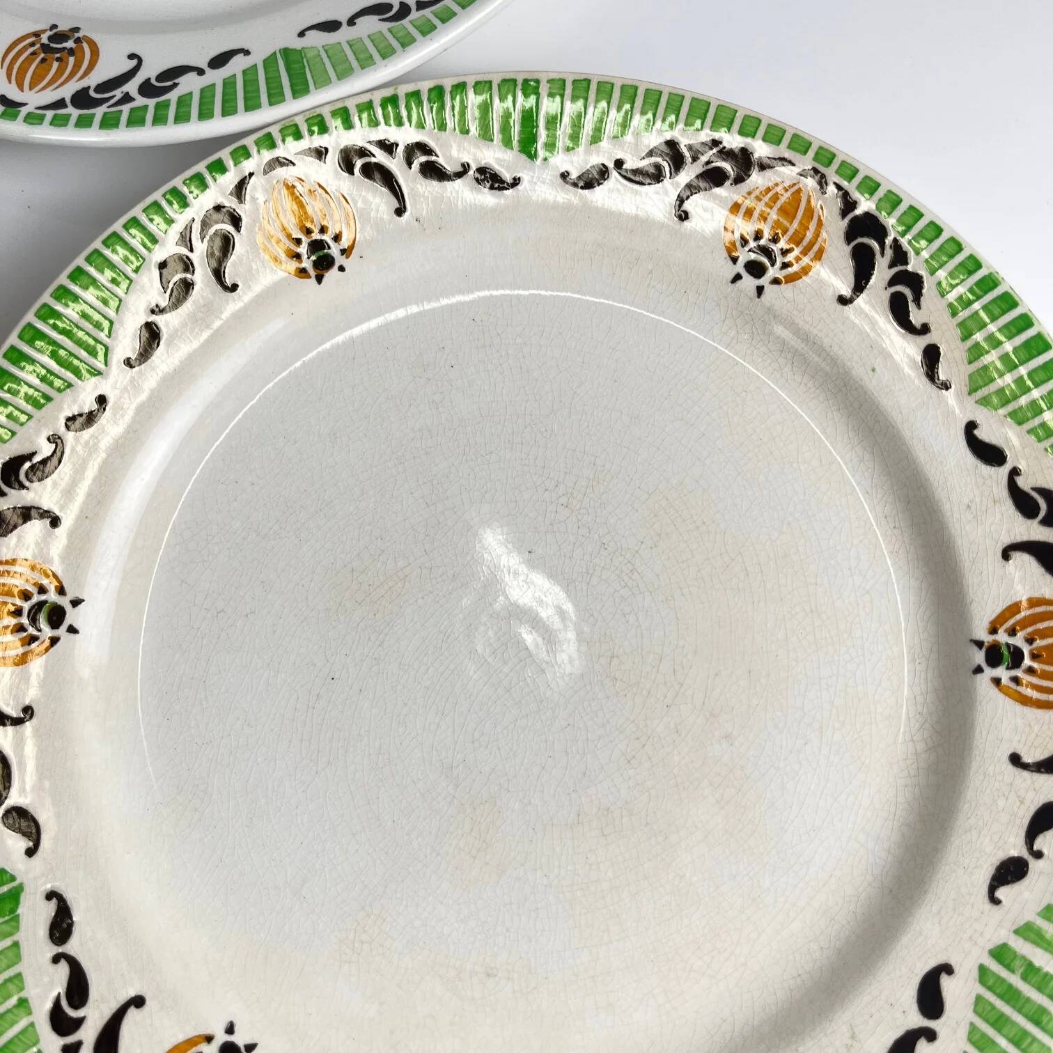 7 assiettes à dessert Sarreguemines "Maroussia", début XXe