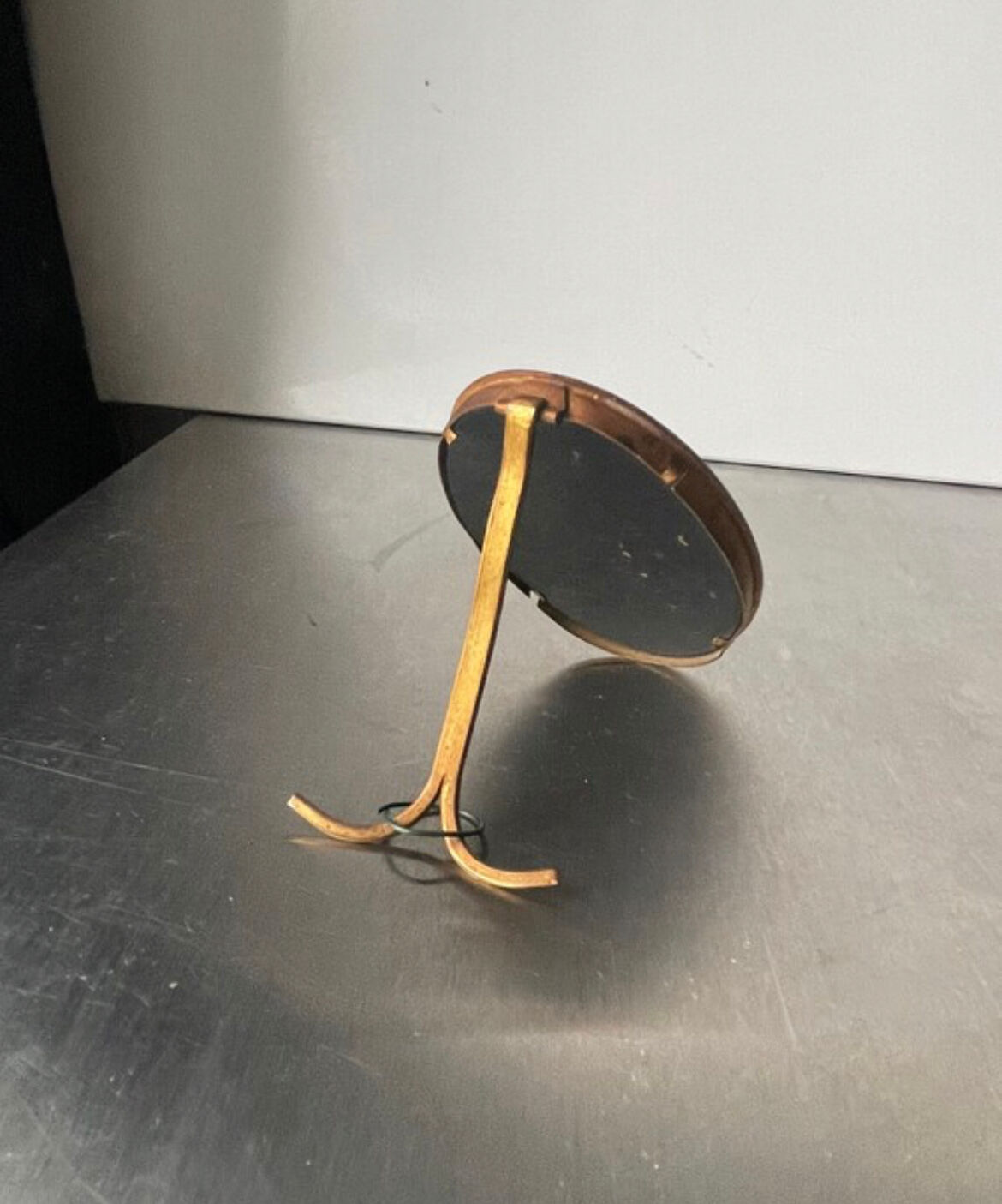 Metal gold colored oval picture frame brass