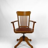 American swivel office armchair in oak, with leather seat, USA, Circa 1900