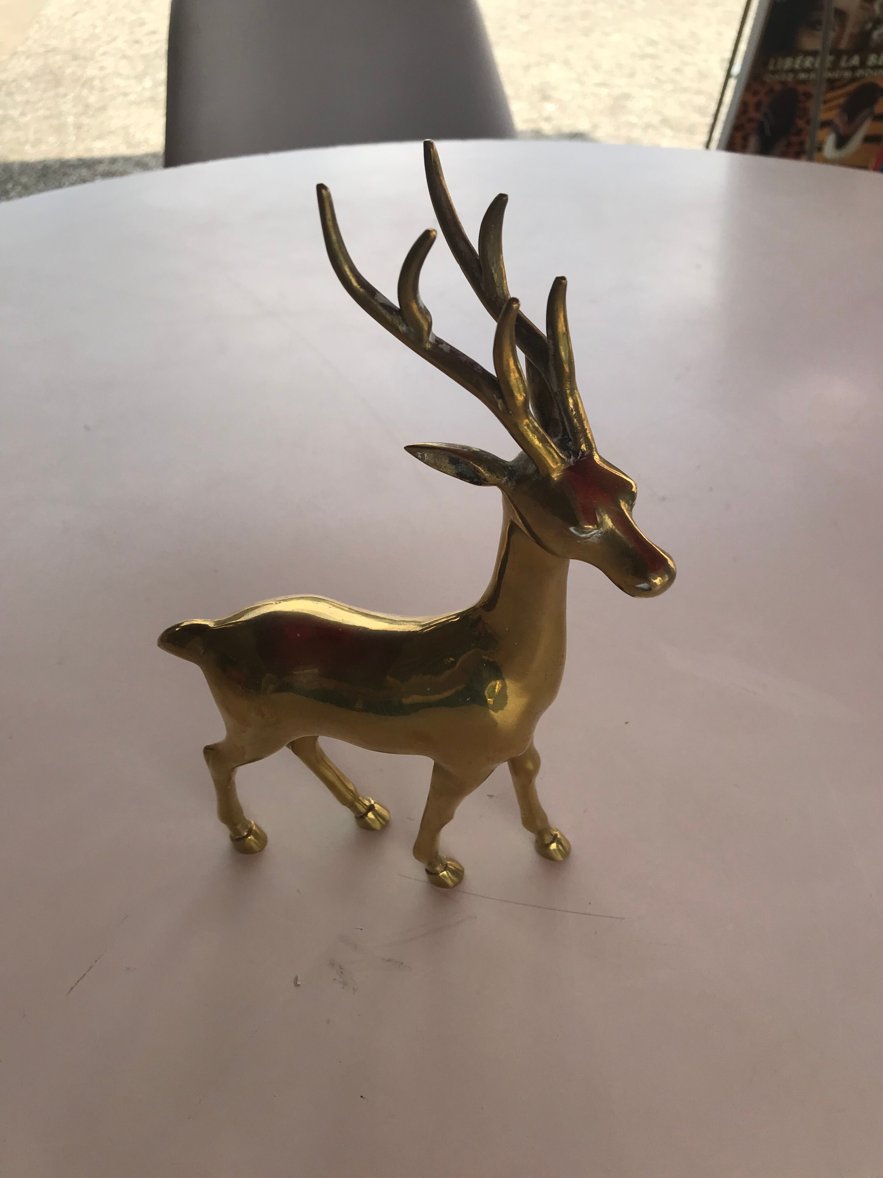 Deer statue in gilded bronze