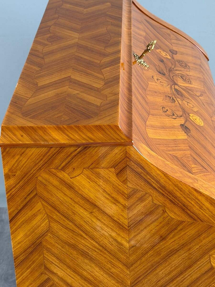 Louis XV style writing desk with a drop-leaf, made of veneer and marquetry, 19th century.