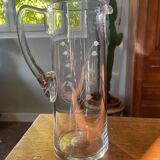 Blown crystal pitcher or carafe with floral motif and engraving