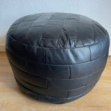 Black patchwork leather pouf from Sède