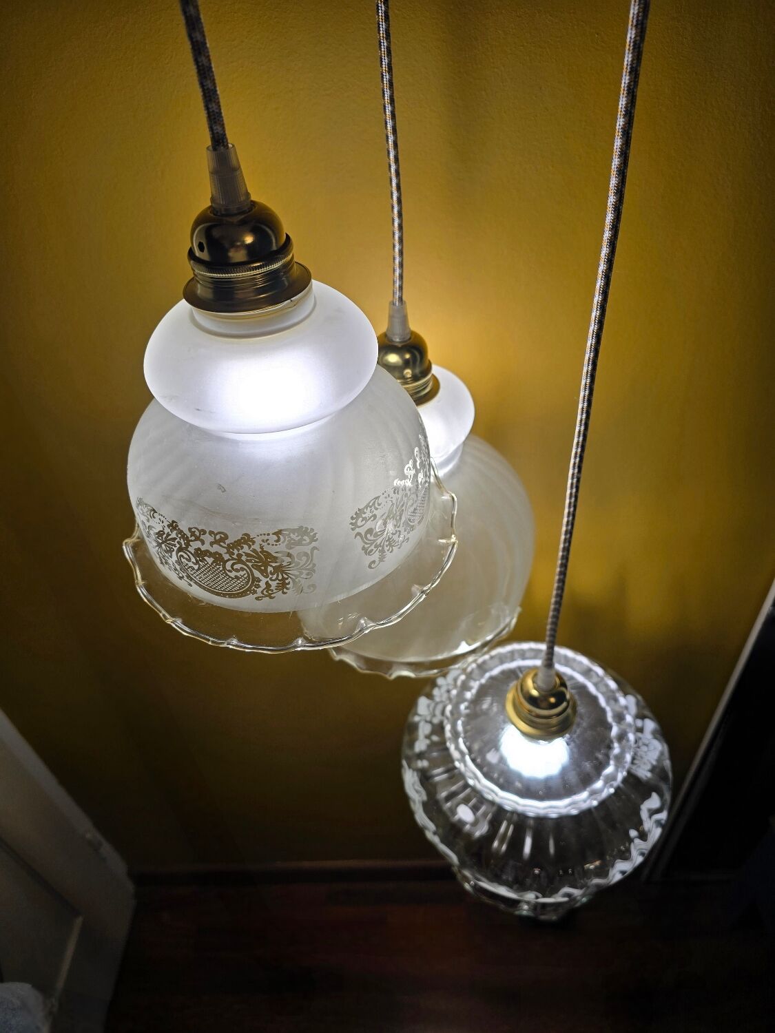 Original suspension of three vintage transparent glass globes.