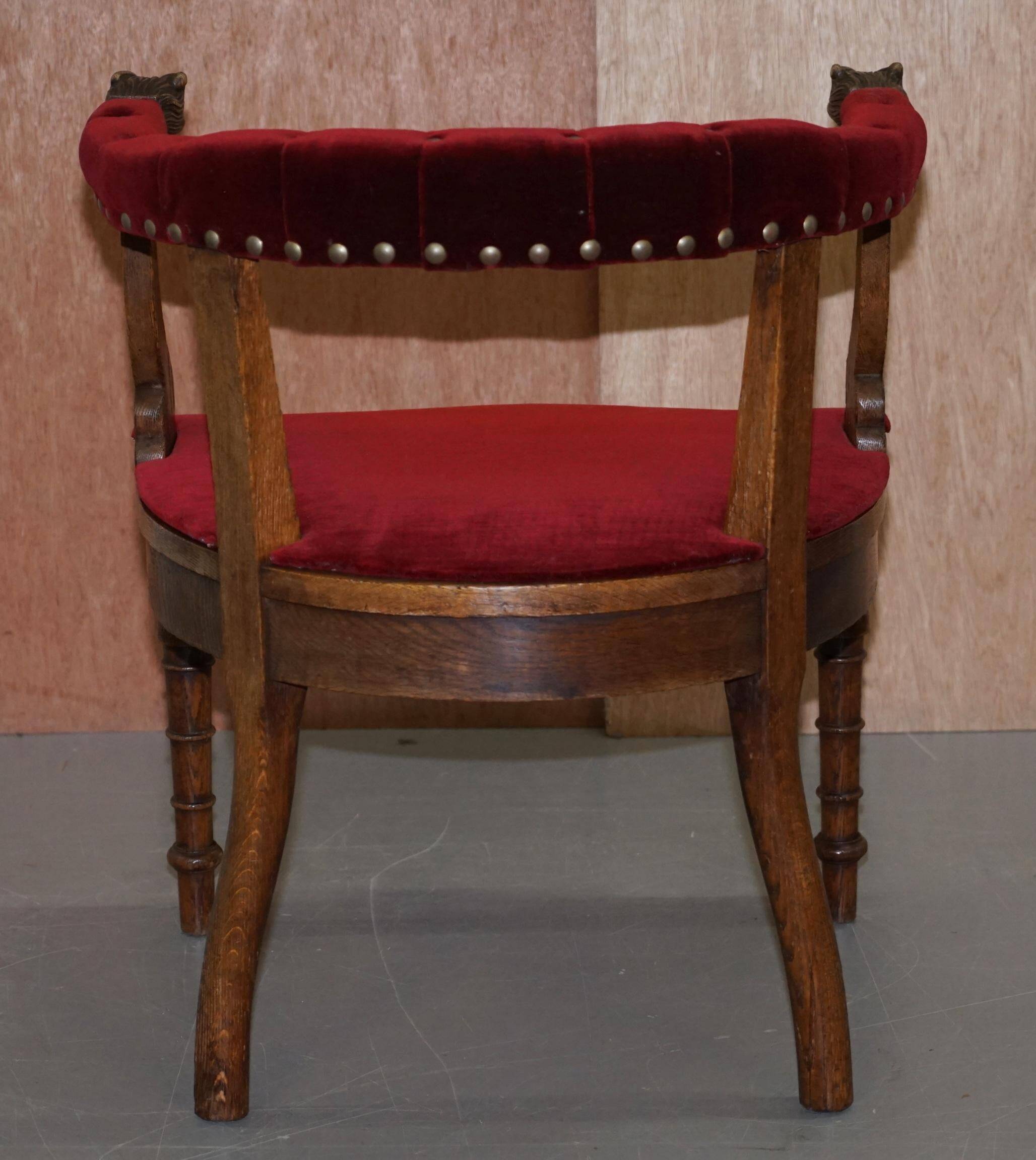 Antique Régence Bergère Armchair in Carved Oak with Lion Head Armrests