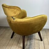 Mustard yellow velvet armchair from the 2010s.
