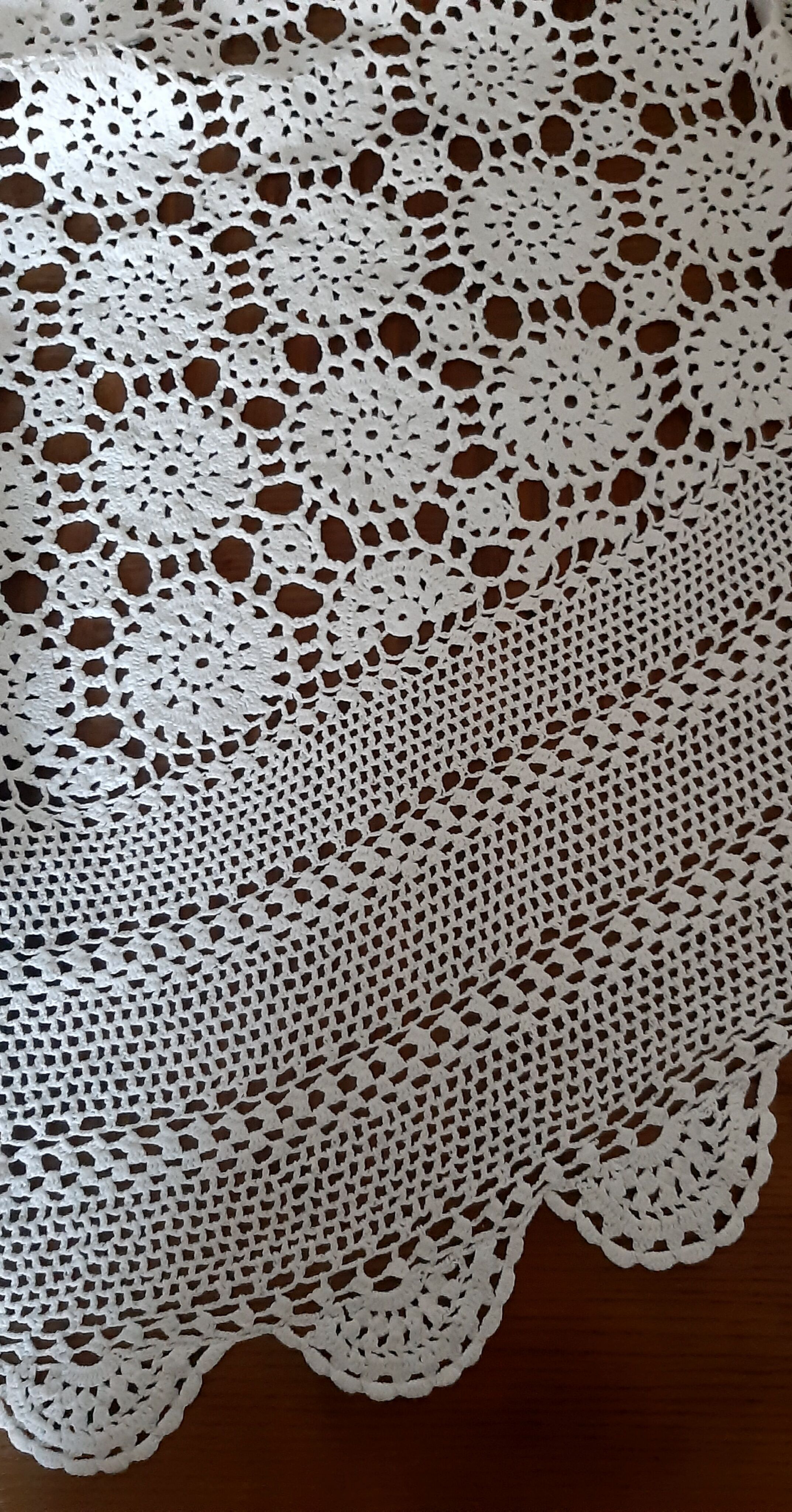Old crocheted round tablecloth