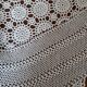 Old crocheted round tablecloth