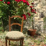 Antique chair seat upholsterer medallions