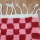 Handmade pure wool rug in traditional pink and red, 150/250 cm.