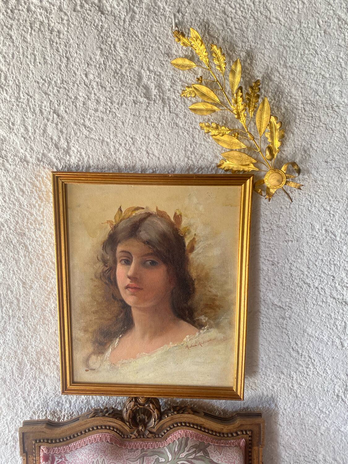 Portrait of a young woman with a laurel crown.