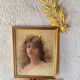 Portrait of a young woman with a laurel crown.