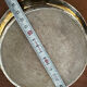 Antique silver-plated bottle coaster with floral decoration.