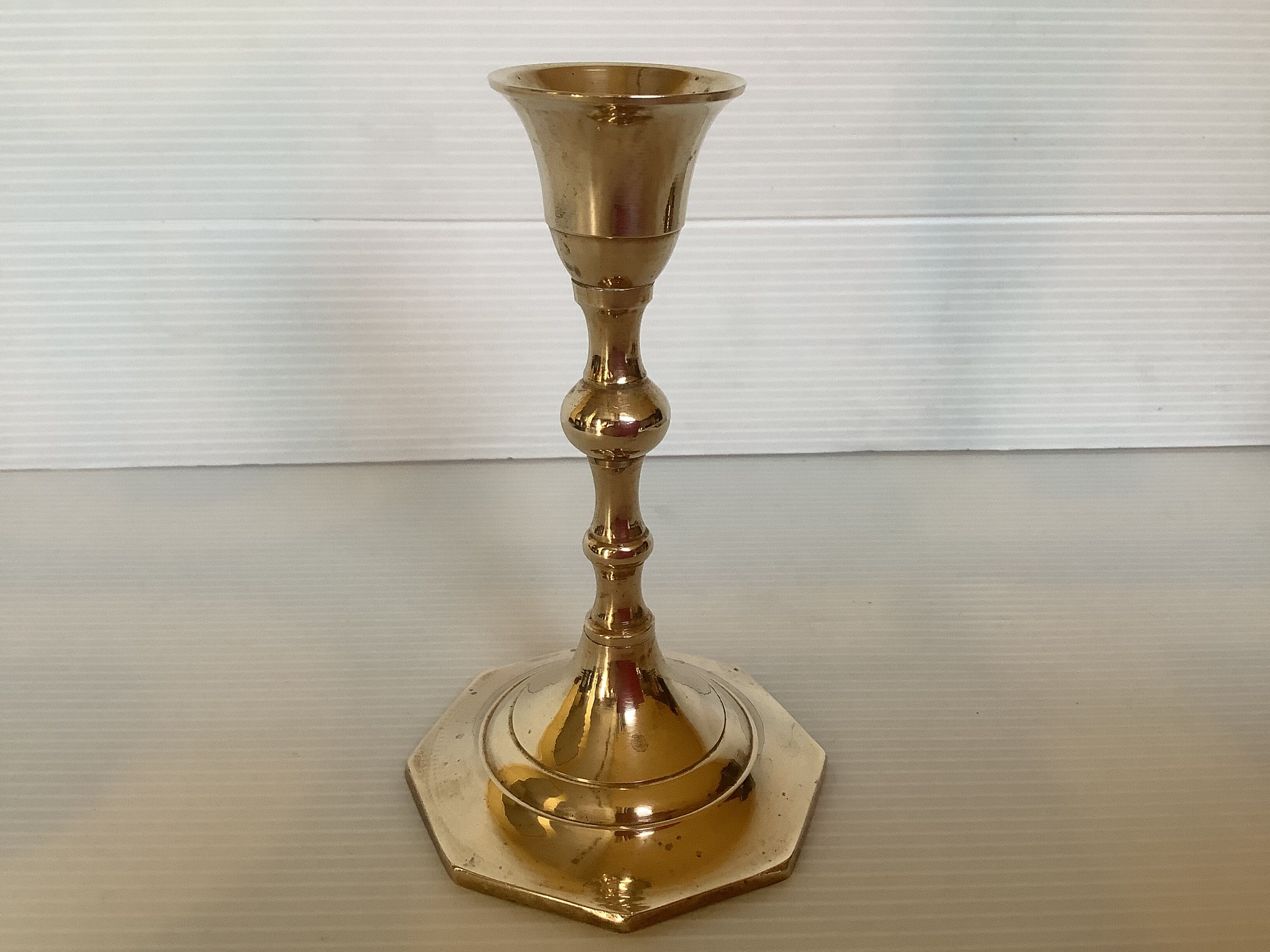 Trio of brass candle holders