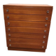 Brown teak Mid-Century chest of drawers with 7 drawers from the 1960s, sleek lines, discreet base.