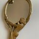 Art Nouveau brass mirror for women