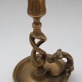 Antique bronze candlestick with dragon-shaped handle from the 17th century