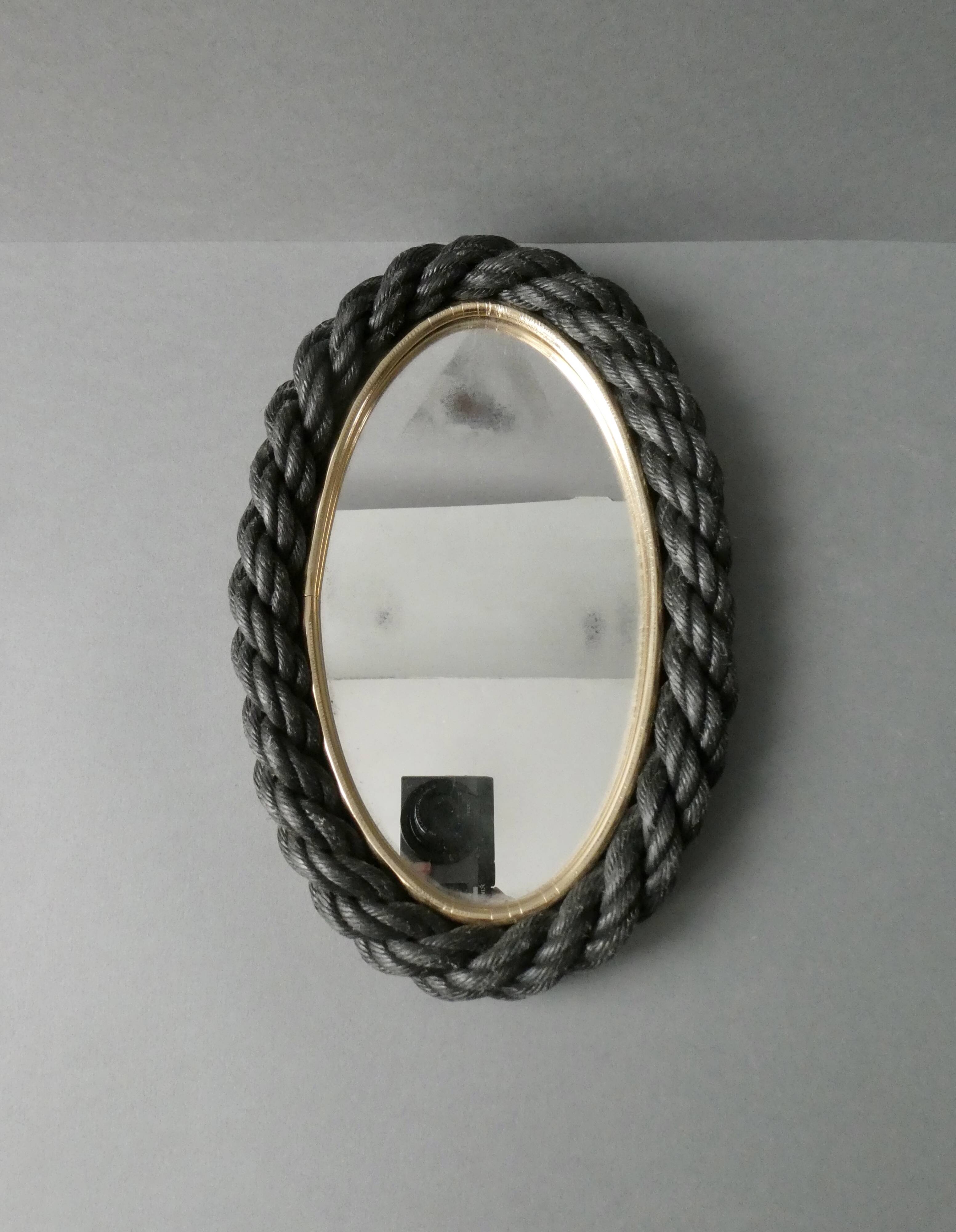 Oval mirror in black rope and gold edging, 1960s