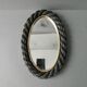 Oval mirror in black rope and gold edging, 1960s