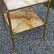 Pair of neoclassical side tables in bronze, brass, marble, and o.