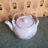 Teapot with flower and wooden handle