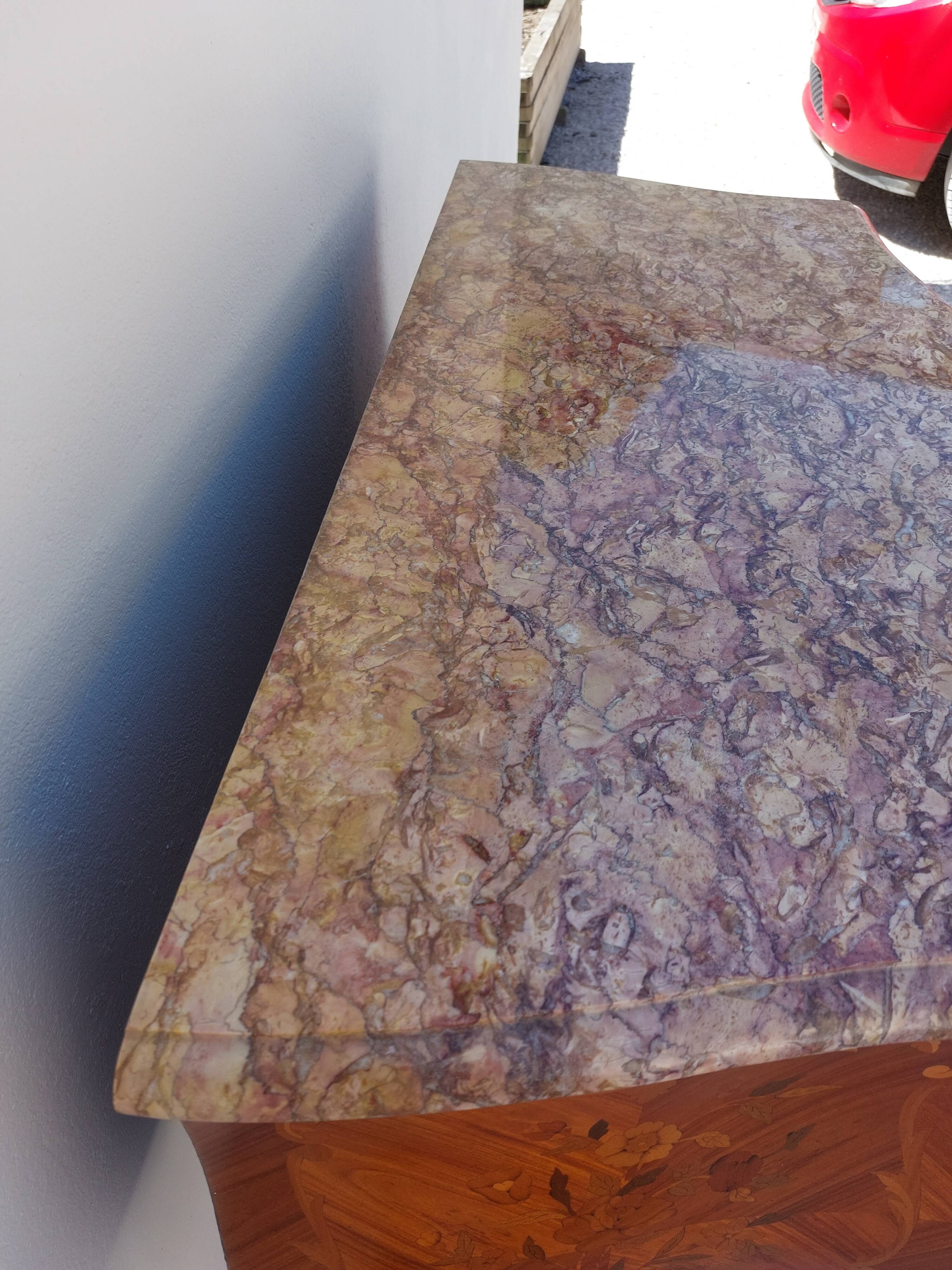 Louis XV chest of drawers in rosewood marquetry