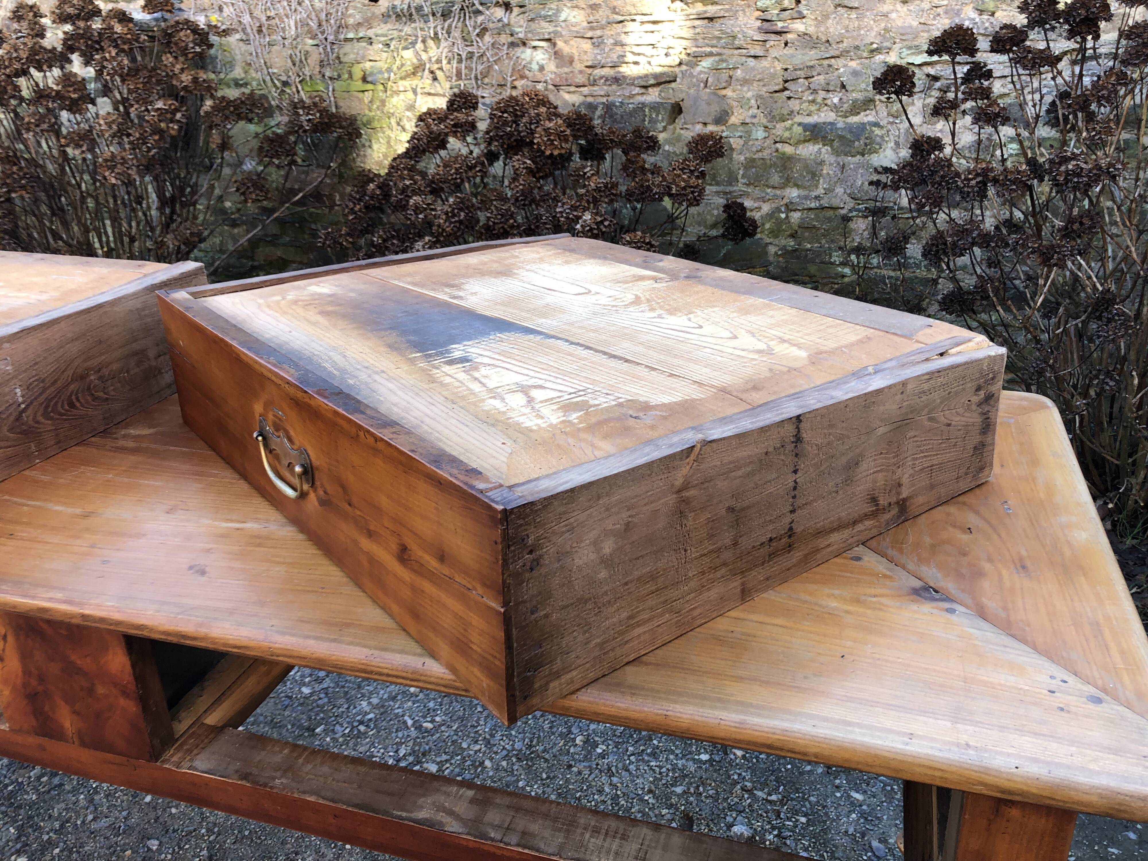 Antique cherry farmhouse table with turned legs and 2 drawers.