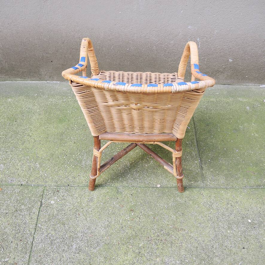 Old wicker chair for children